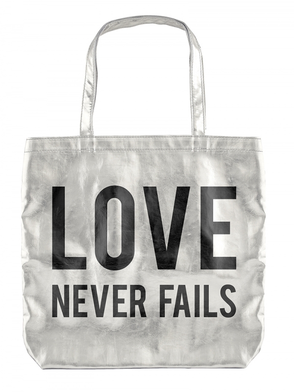 LOVE NEVER FAILS METALLIC TOTE BAG